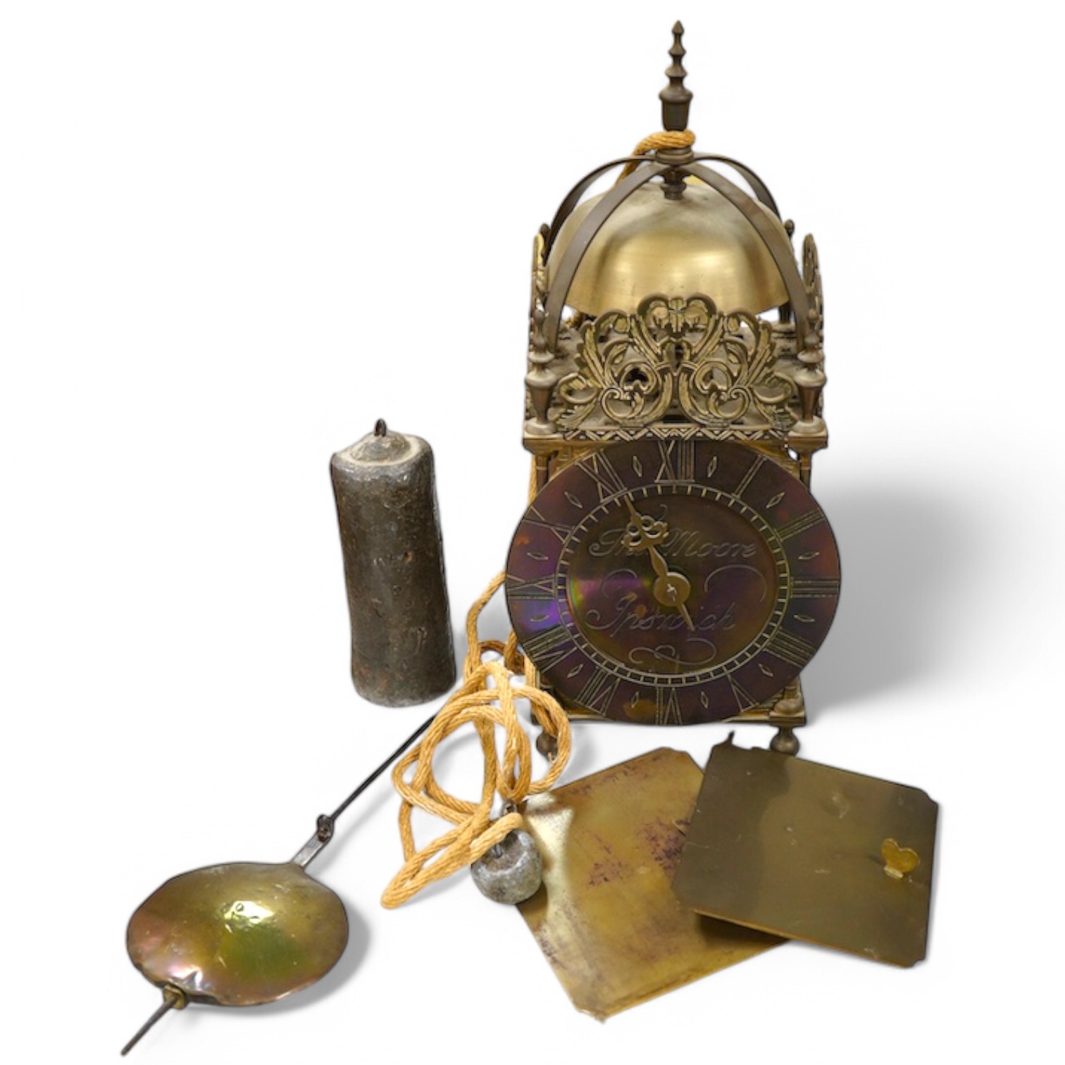 After Thomas Moore of Ipswich, a brass cased lantern clock with a weight driven pendulum movement with anchor escapement, 36cm high. Condition - fair.